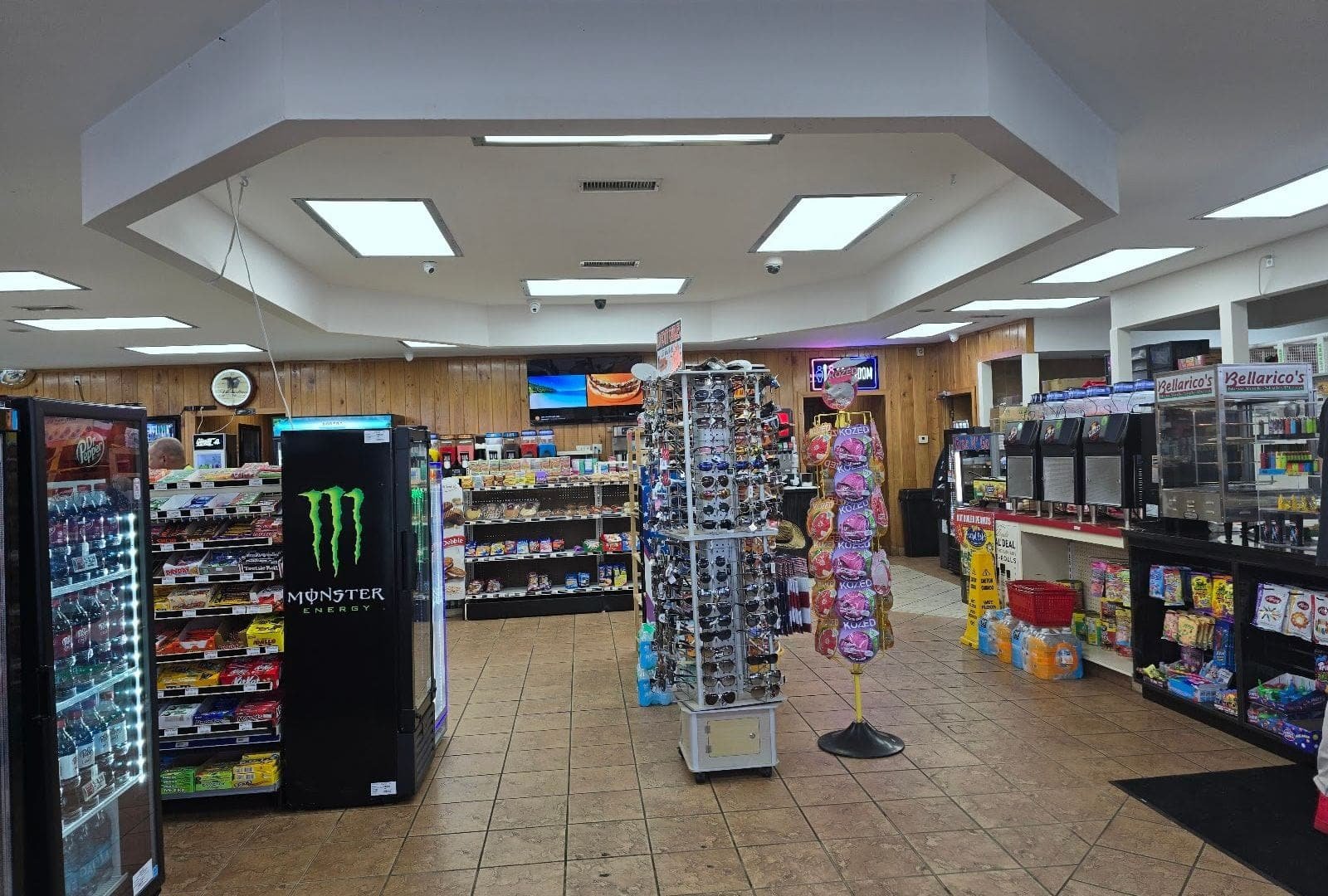 Inside Bent Creek Grocery on Bent Creek Road, Auburn, looking down the aisles toward the counter